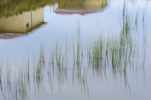 Reflection of the house in the lake. Reflection in water