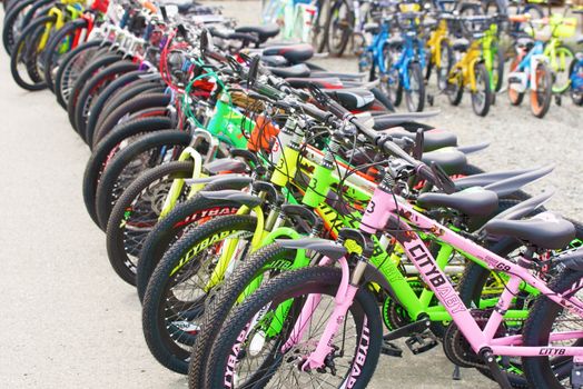 NAKHODKA, RUSSIA - May 16, 2018: Row of bicycles for sale Bicycle shop