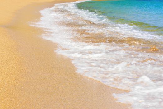 Sea surf on the beach. Sand beach and turquoise sea