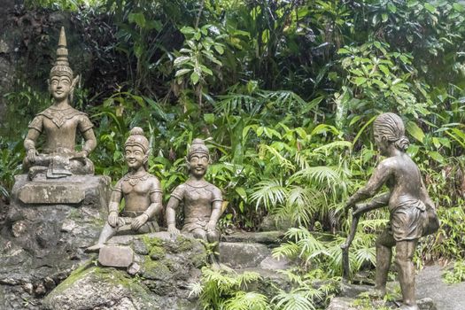 Buddha statues at Tar Nim Waterfall & Secret Magic Garden on Koh Samui, in Surat Thani Thailand.