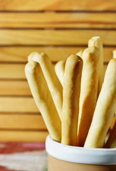 Delicious breadsticks in jar , long sticks of crisp dry baked bread 