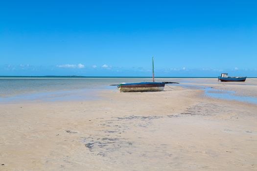 Boats at Magaruque island formerly Ilha Santa Isabel is part of the Bazaruto Archipelago off the coast of Mozambique.