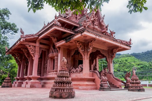 Wat Sila Ngu with the red temple Wat Ratchathammaram on Koh Samui island in Surat Thani, Thailand.