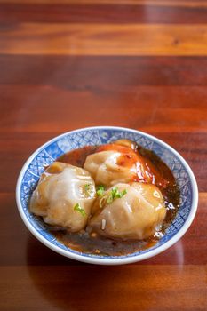 Bawan (Ba wan), Taiwanese meatball delicacy, delicious street food, steamed starch wrapped round shaped dumpling with pork inside, close up, copy space