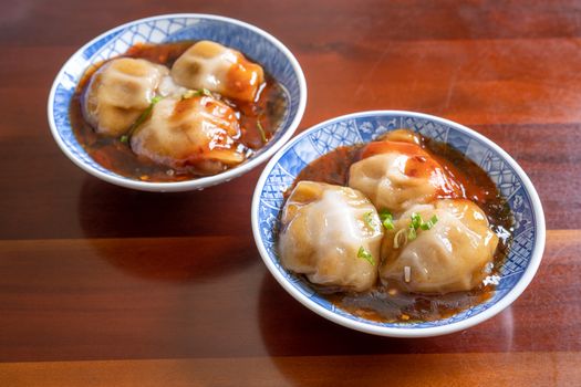 Bawan (Ba wan), Taiwanese meatball delicacy, delicious street food, steamed starch wrapped round shaped dumpling with pork inside, close up, copy space