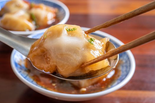 Bawan (Ba wan), Taiwanese meatball delicacy, delicious street food, steamed starch wrapped round shaped dumpling with pork inside, close up, copy space