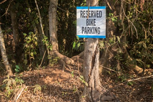 Close-Up Of Bicycle Parking Sign On a Tree, Goa