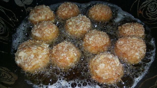 Closeup view of fried pizza bomb or pizza balls. Pizza bombs are delicious and tasty altered form of pizza.