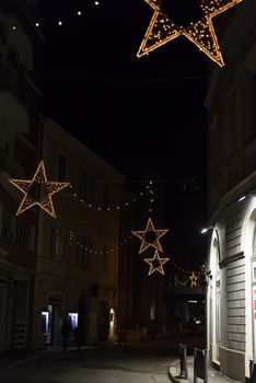 Christmas decorations in the city with light strips and projections