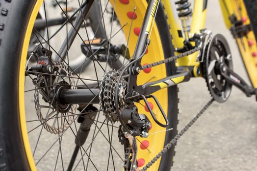 Bicycle wheel. Yellow bicycle close-up. Sport and active life concept