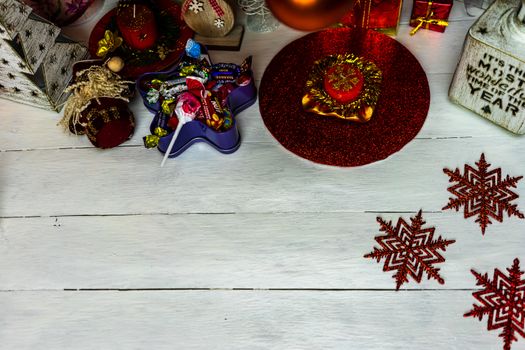 Christmas ornaments decorations and gifts under the  Christmas tree.