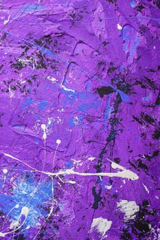 Photo of creative textured background in blue, purple, black and white grunge colors, paint and splash drops backdrop