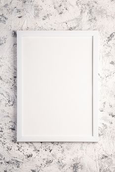 White empty template picture frame on textured bright, grey and black background, top view, mockup copy space