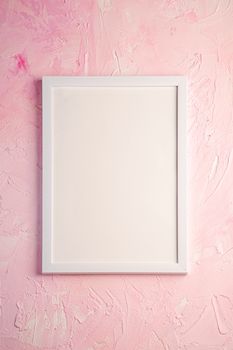 White empty template picture frame on textured bright, pink and peach background, top view, mockup copy space