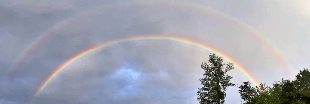 Stunning natural double rainbows plus supernumerary bows seen at a lake in northern germany.