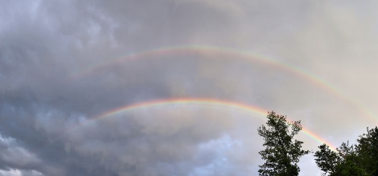 Stunning natural double rainbows plus supernumerary bows seen at a lake in northern germany.