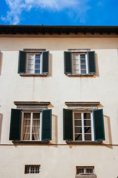 Beautiful historic architecture in old town Lucca Italy on a cool winter's evening