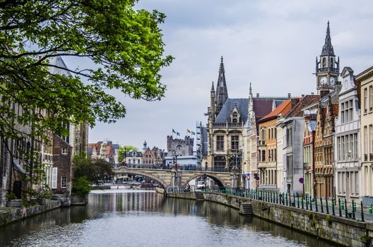 Navigating one of the canals of the Belgian city as it passes through the center of the city