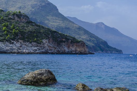 The mountains fall abruptly at the height of the reserve of the zingaro sicily