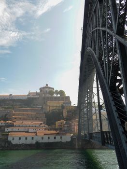Porto, Portugal, October 2010: Vertical side view on famous Dom Luis I Bridge over river Douro on Porto, Portugal