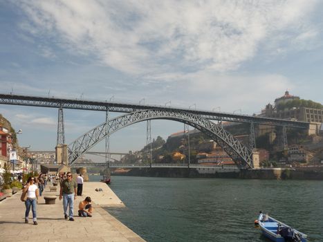 Porto, Portugal, October 2010: Horizontal side view on famous Dom Luis I Bridge over river Douro on Porto, Portugal