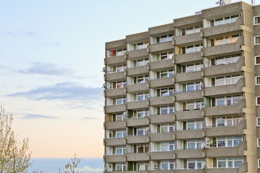 Block of flats, residential building, large building with sunset in Leherheide, Bremerhaven, Germany.