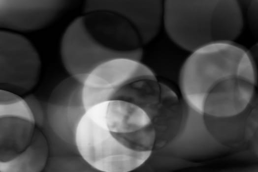 Black and white background. Abstract gray circles