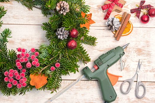 Christmas crafts. Christmas decorations on wooden background