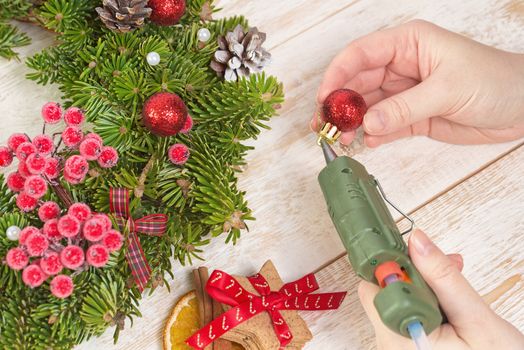 Christmas crafts. Christmas decorations on wooden background