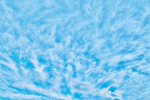 Clouds in blue sky. Sky with fluffy clouds background