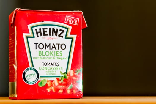 Antwerp, Belgium, September 2020: Illustrative Editorial: Heinz Tomato cubes in carton. Gluten Free. With basil and Oregano