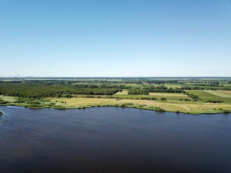 Sellstedter See lake and Ochsentriftmoor taken from above with a drone in Lower Saxony, Germany.