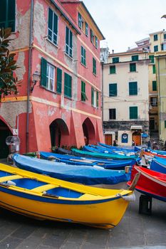 Boats are brought on sure in the harbour of Vernazza in Cinque Terre, Italy