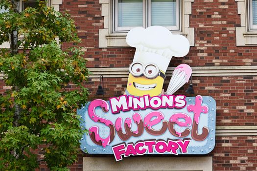OSAKA, JAPAN - Apr 21, 2017 : Photo of "HAPPY MINION SWEET FACTORY" shop, selling Minion Sweets and waffle, located in Universal Studios JAPAN, Osaka, Japan. Minions are famous character