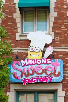 OSAKA, JAPAN - Apr 21, 2017 : Photo of "HAPPY MINION SWEET FACTORY" shop, selling Minion Sweets and waffle, located in Universal Studios JAPAN, Osaka, Japan. Minions are famous character