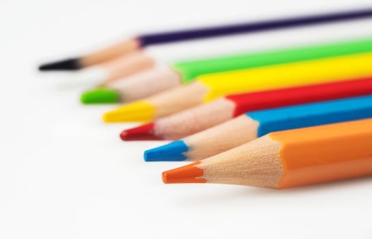 Close up of color pencils on white background. Back to school concept