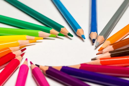Color pencils on white background.Close up. Copy space. Back to school concept.