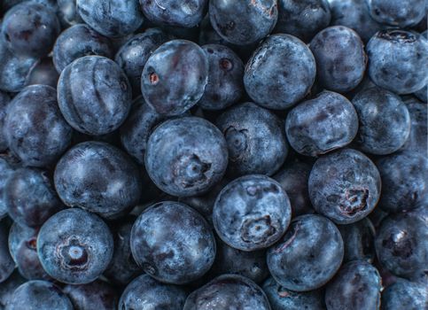 Close up shot from above to pile of blueberries.