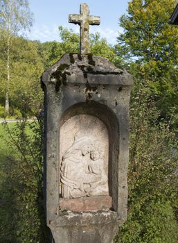 Antique Christian wayside shrine in Bavaria, Germany 