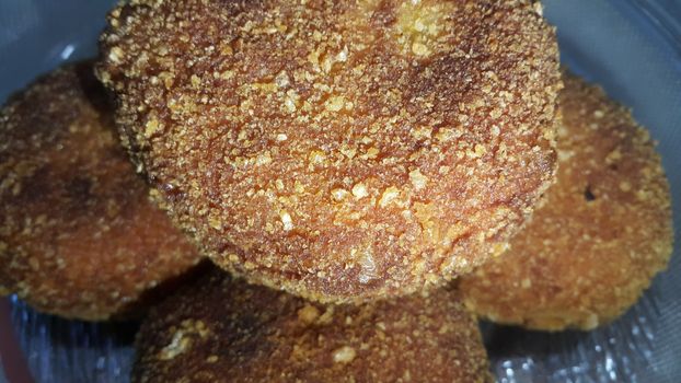 Closeup view of fried pizza bomb or pizza balls. Pizza bombs are delicious and tasty altered form of pizza.