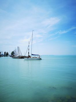 A small boat in a large body of water. High quality photo