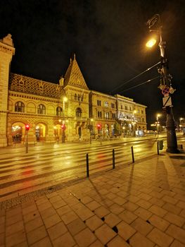 Main customs square street view in Budapest in the evening lights. High quality photo