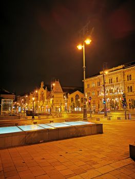 A sign in front of a building. High quality photo