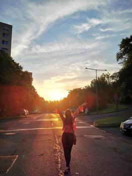A woman walking down the street. High quality photo