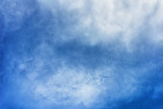 Clouds in blue sky. Sky with fluffy clouds background