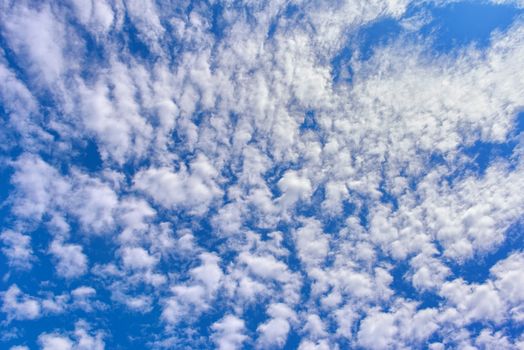 Clouds in blue sky. Sky with fluffy clouds background