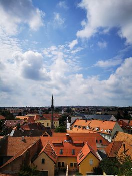 Rows of houses and buildings in Eger, and the beautiful blue sky High quality photo