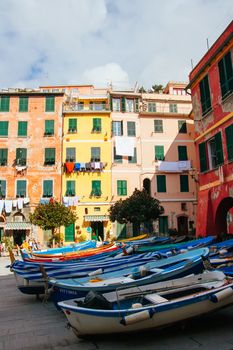 Boats are brought on shore in the harbour of Vernazza in Cinque Terre, Italy