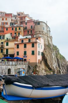 Manarola waterfront on a stormy day in the Cinque Terre, Italy