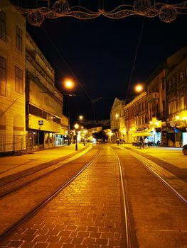 A train on the tracks at night. High quality photo